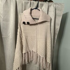 Cozy Cream Knit Sweater with Fringe